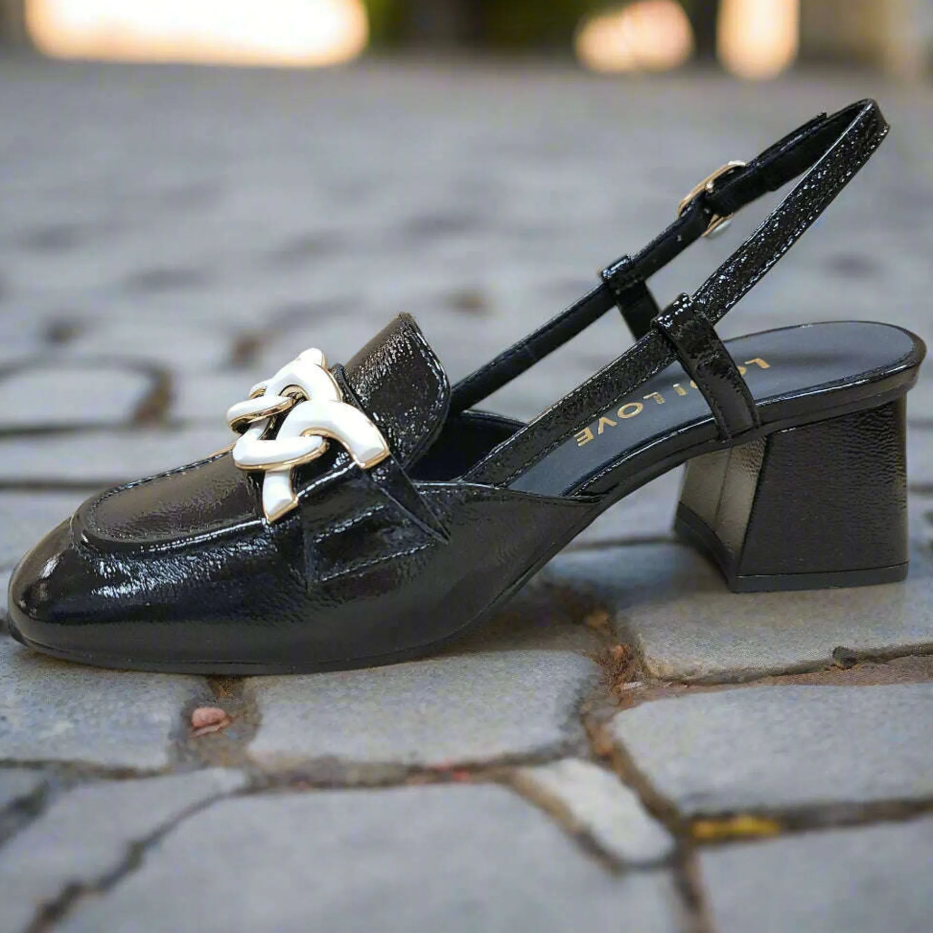 lodi_love__daramis_high_h_2.webp LODI LOVE - DARAMIS High Heel Sling Back Patent Leather Loafer Pump